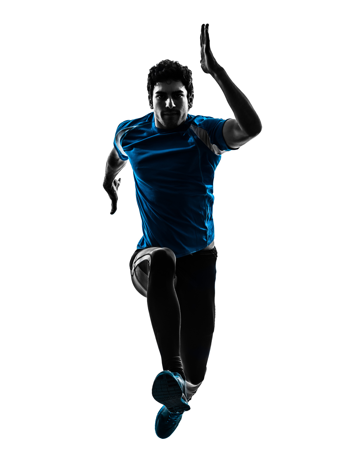 Part silhouette of a man sprinting in mid-air